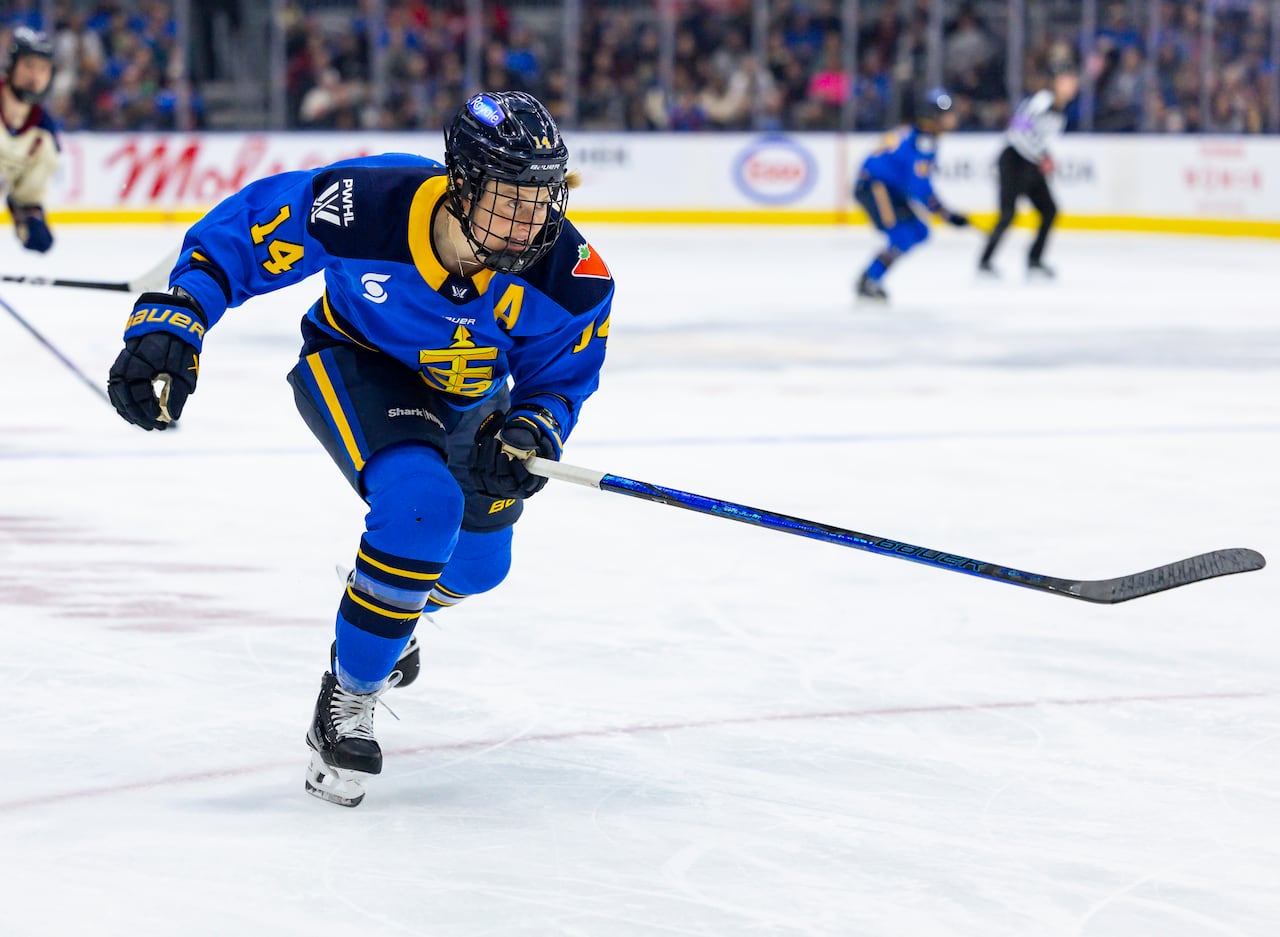A hockey player skates during a game.