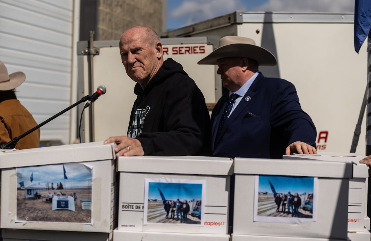 Mitch Sylvestre, leader of the Alberta Prosperity Project, prepares to submit signatures for a separation referendum to Elections Alberta in Edmonton, on Monday, May 4, 2026.