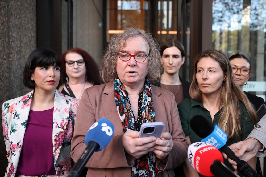 Roxanne Tickle speaks to the media after the Federal Court upheld their 2024 ruling 