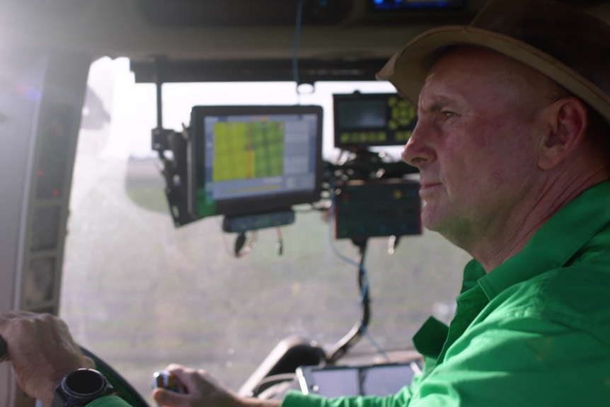 A man in a tractor.